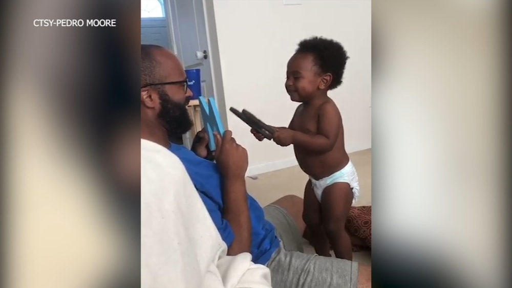 Baby can't stop laughing when dad says 'W": Video