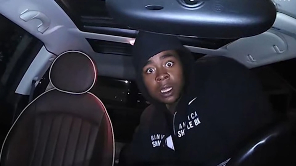 Dash camera catches intruder's stunned face