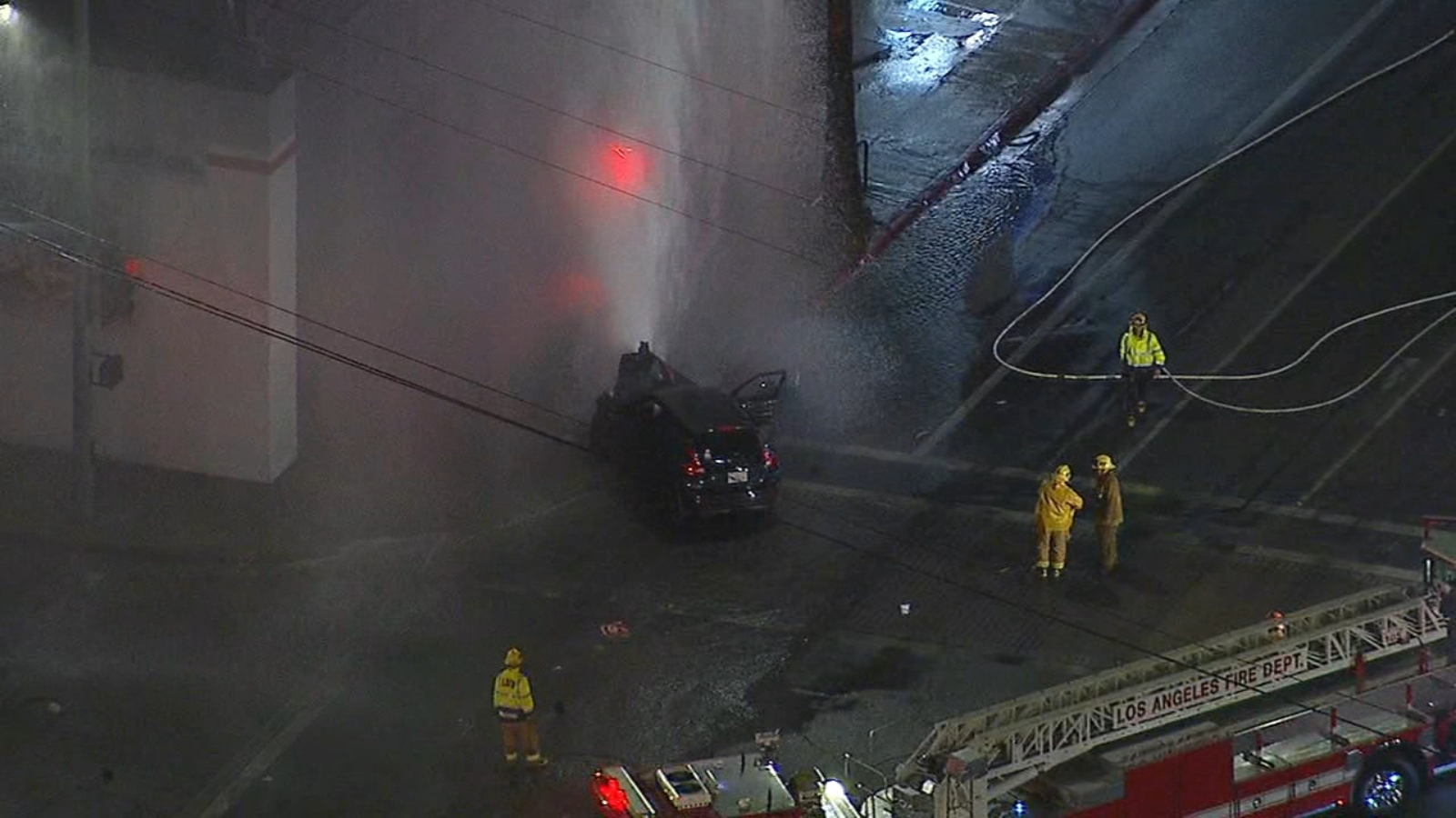 Canoga Park crash leaves 9 hurt after car shears fire hydrant, causes roof collapse of nearby