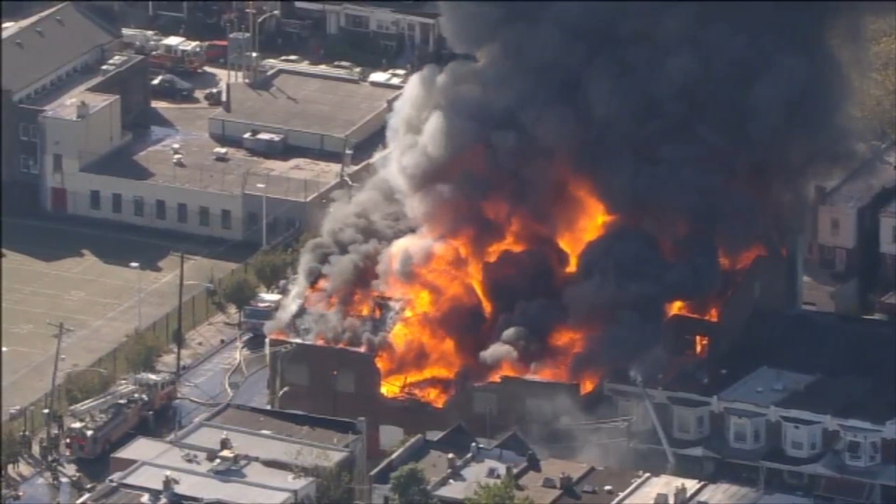 Philadelphia firefighters battle massive blaze at auto garage
