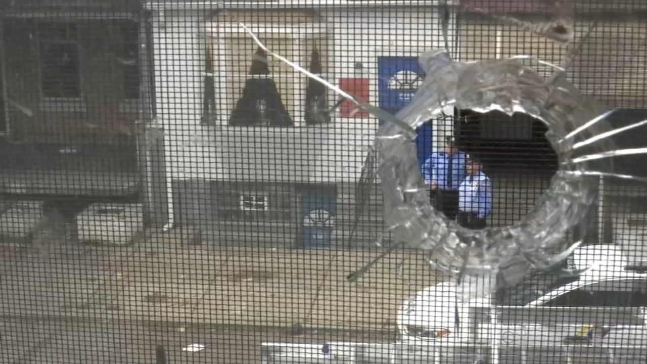 Union workers fix homes damaged in police shootout