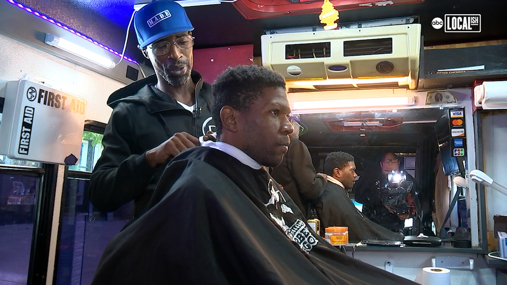Barber takes clippers to the road in Harlem's first mobile barbershop