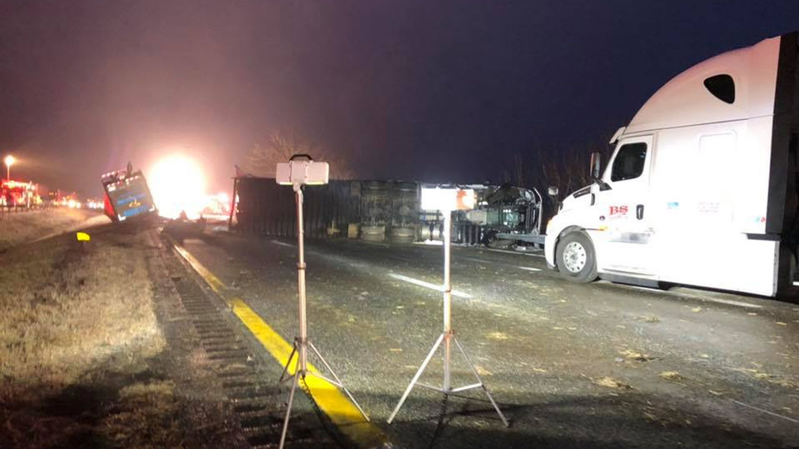 At least 24 hospitalized after tractortrailer, Silver Lining Tour bus