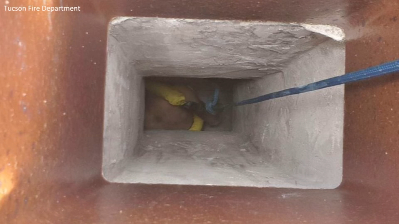 Wanted Arizona man rescued from chimney