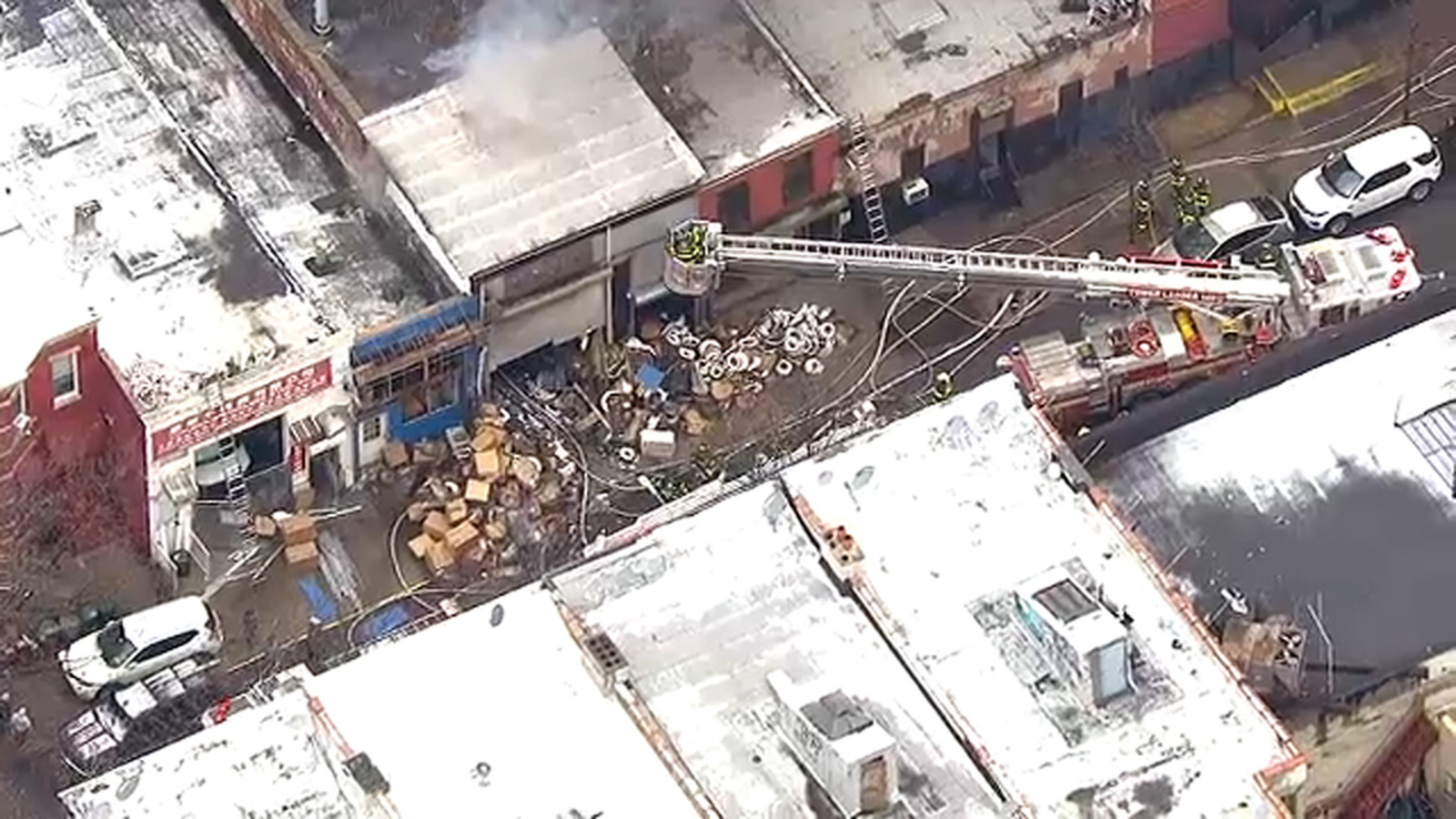 4 firefighters hurt battling 4-alarm warehouse fire in Sunset Park ...