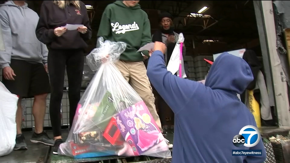 Families in need receive Christmas toys donated during ABC7's Spark of Love Toy Drive