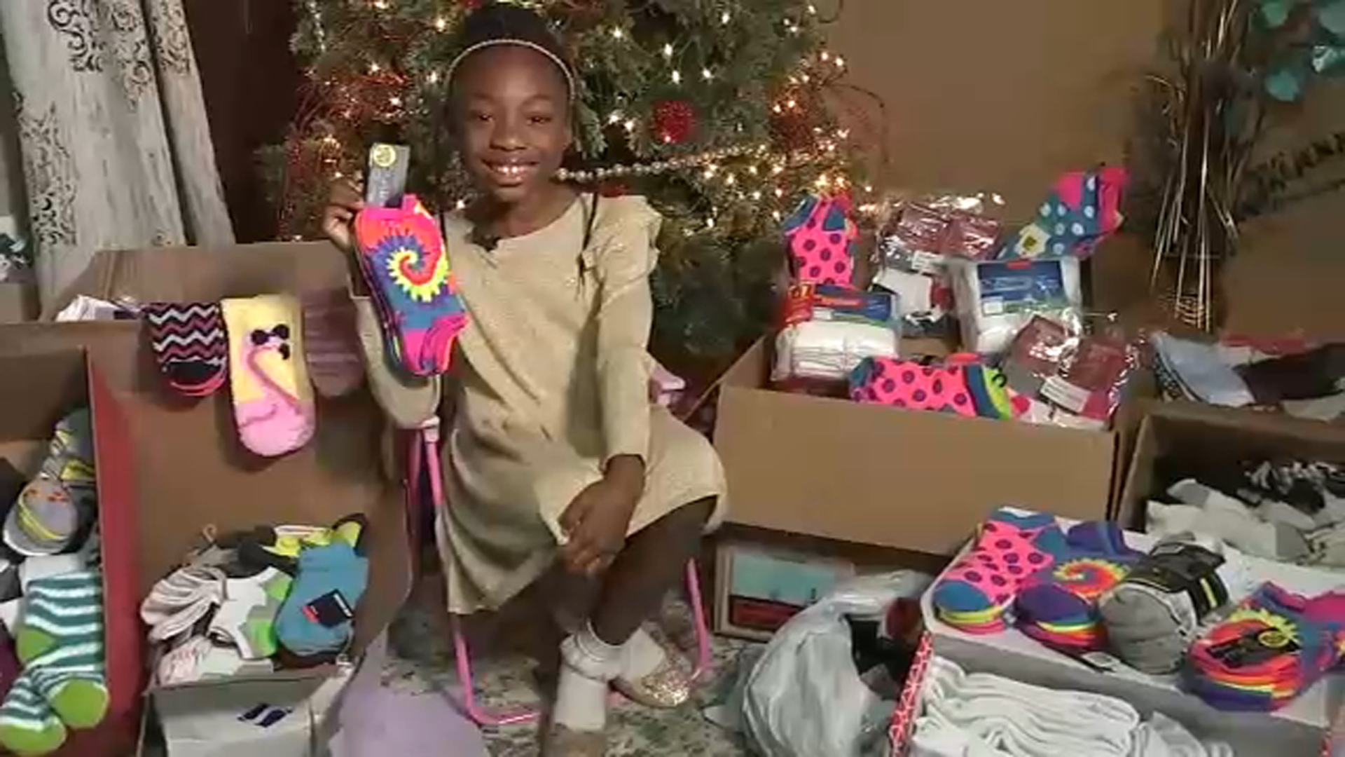 Girl, 8, passes on gifts to outfit homeless with socks