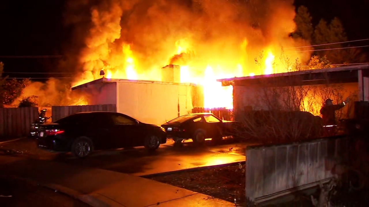 Firefighter injured as crews battle massive flames at Reedley home