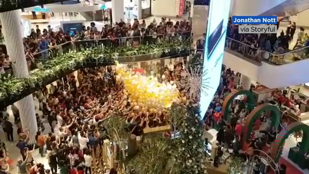 Shoppers injured after Christmas balloon-drop in Sydney mall goes horribly wrong