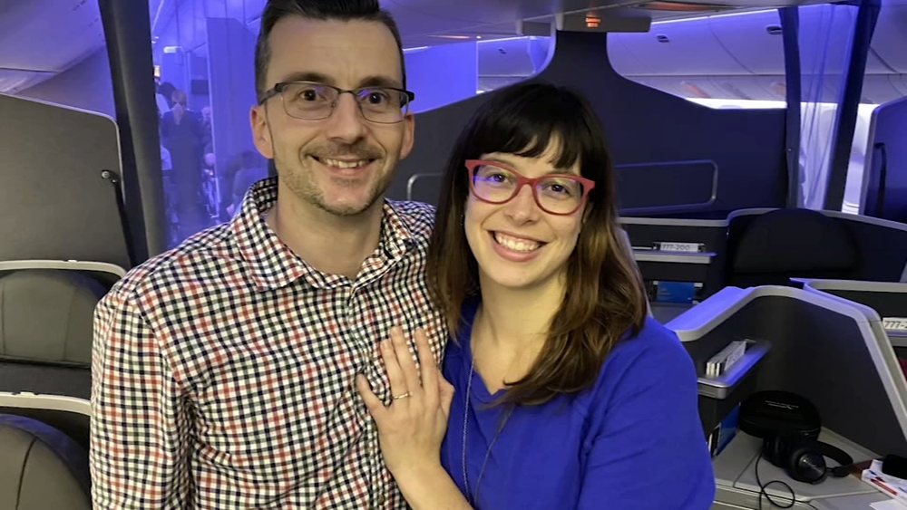 Cary couple engaged after surprise Christmas Eve proposal on flight from Raleigh to London