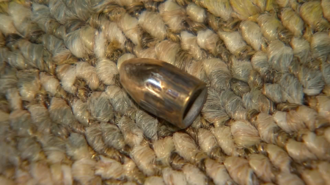 Durham woman lucky to be alive after celebratory gunfire comes through window