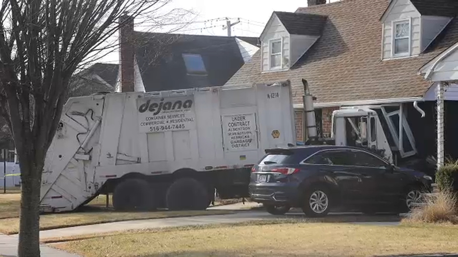 Garbage truck crashes into Albertson home, injuring 1 person ABC7 New