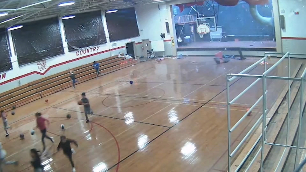 VIDEO: Students run to safety as strong wind blows roof off school gym