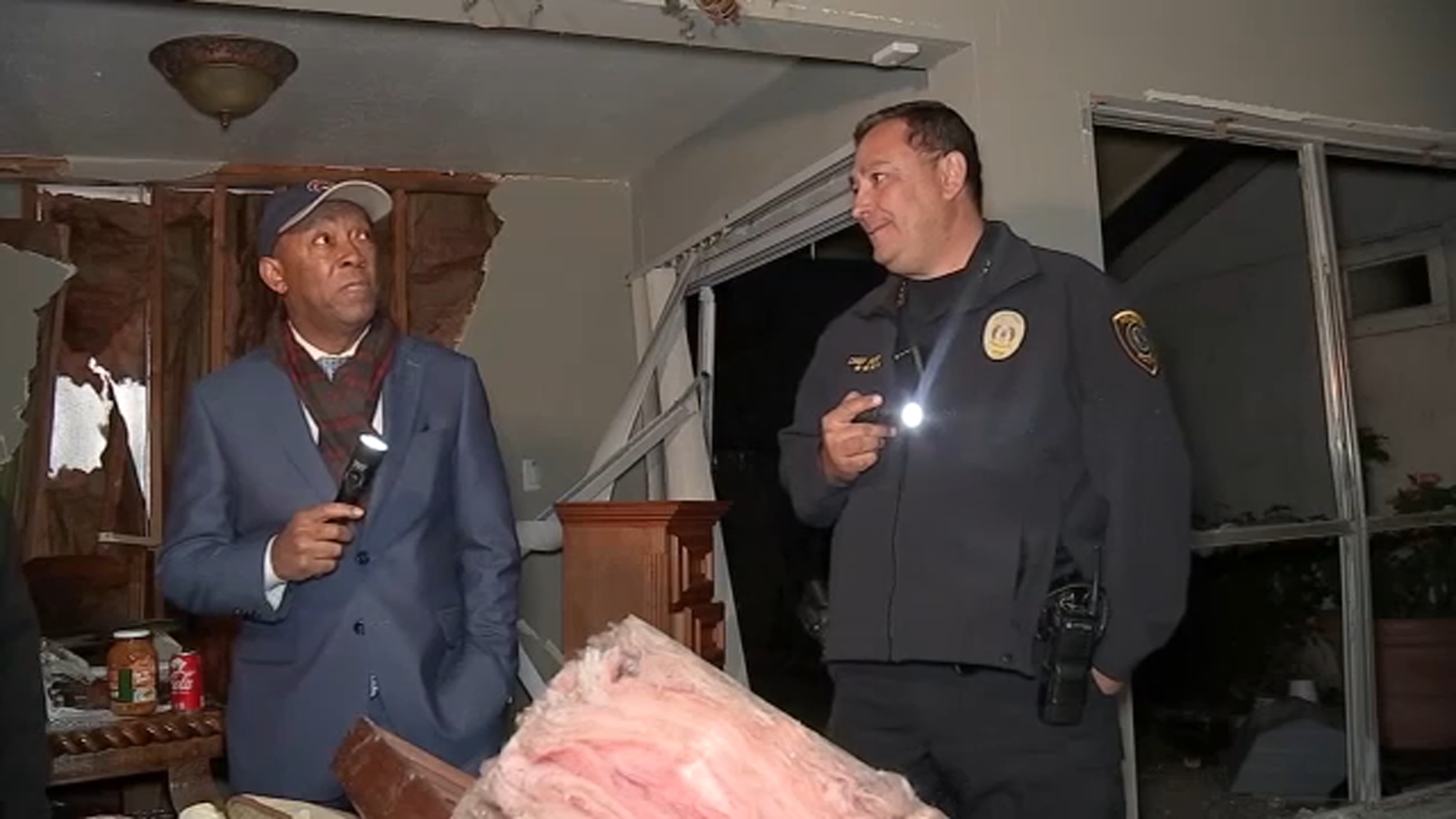 City officials help community members sort through debris