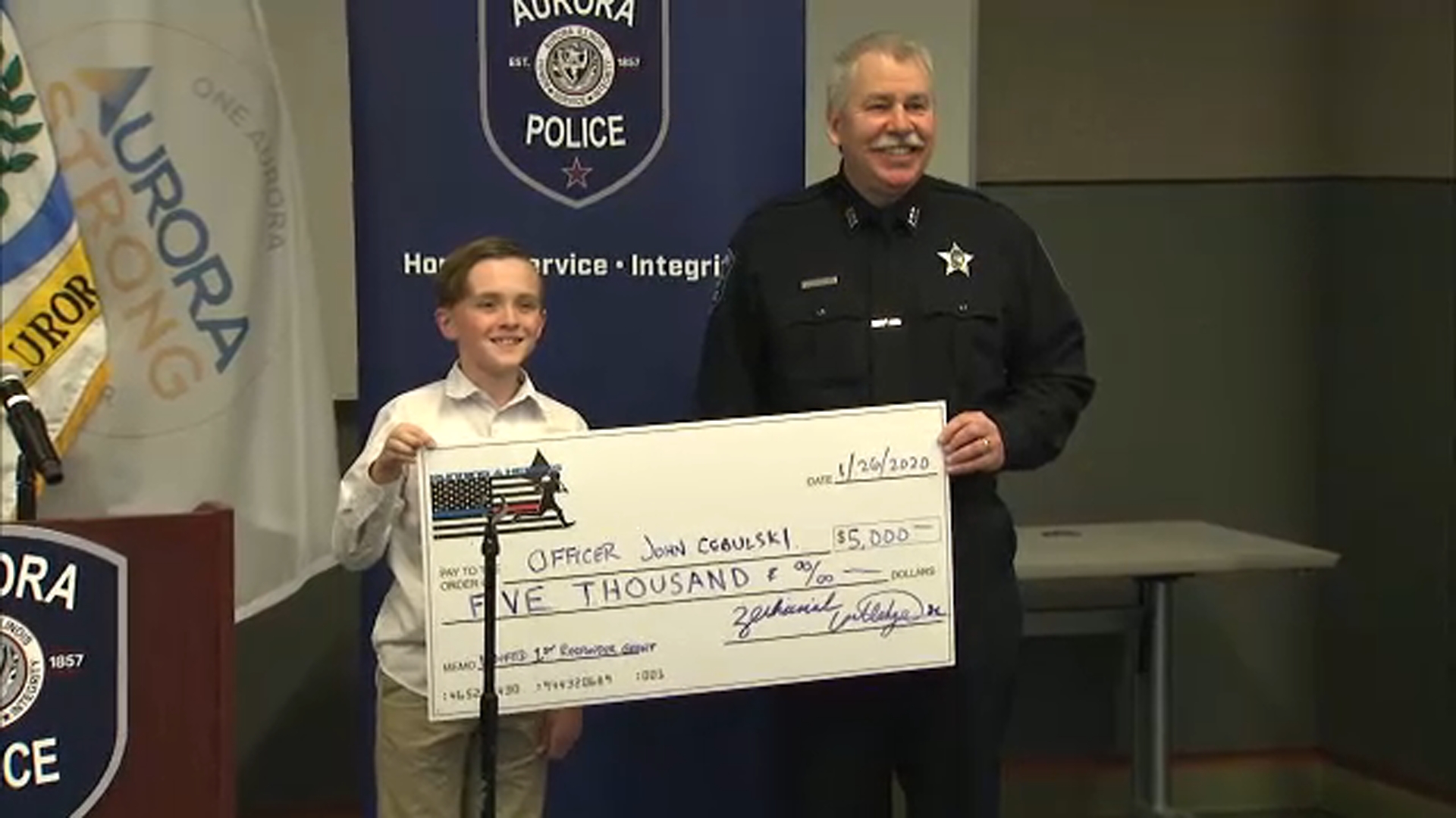 Boy, 11, honors Aurora officer wounded in Henry Pratt shooting