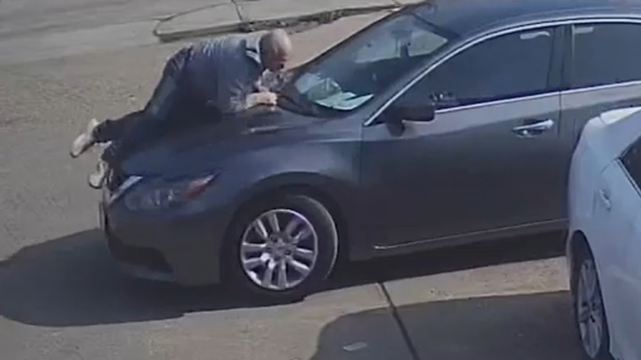 Man rides hood of car to stop driver after fender bender