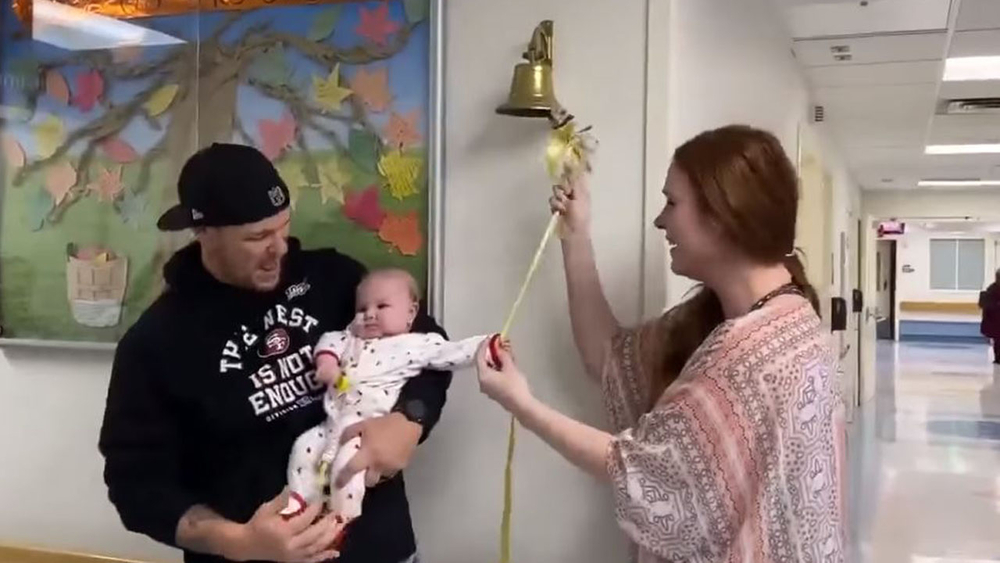 VIDEO: Baby rings cancer bell after beating brain cancer