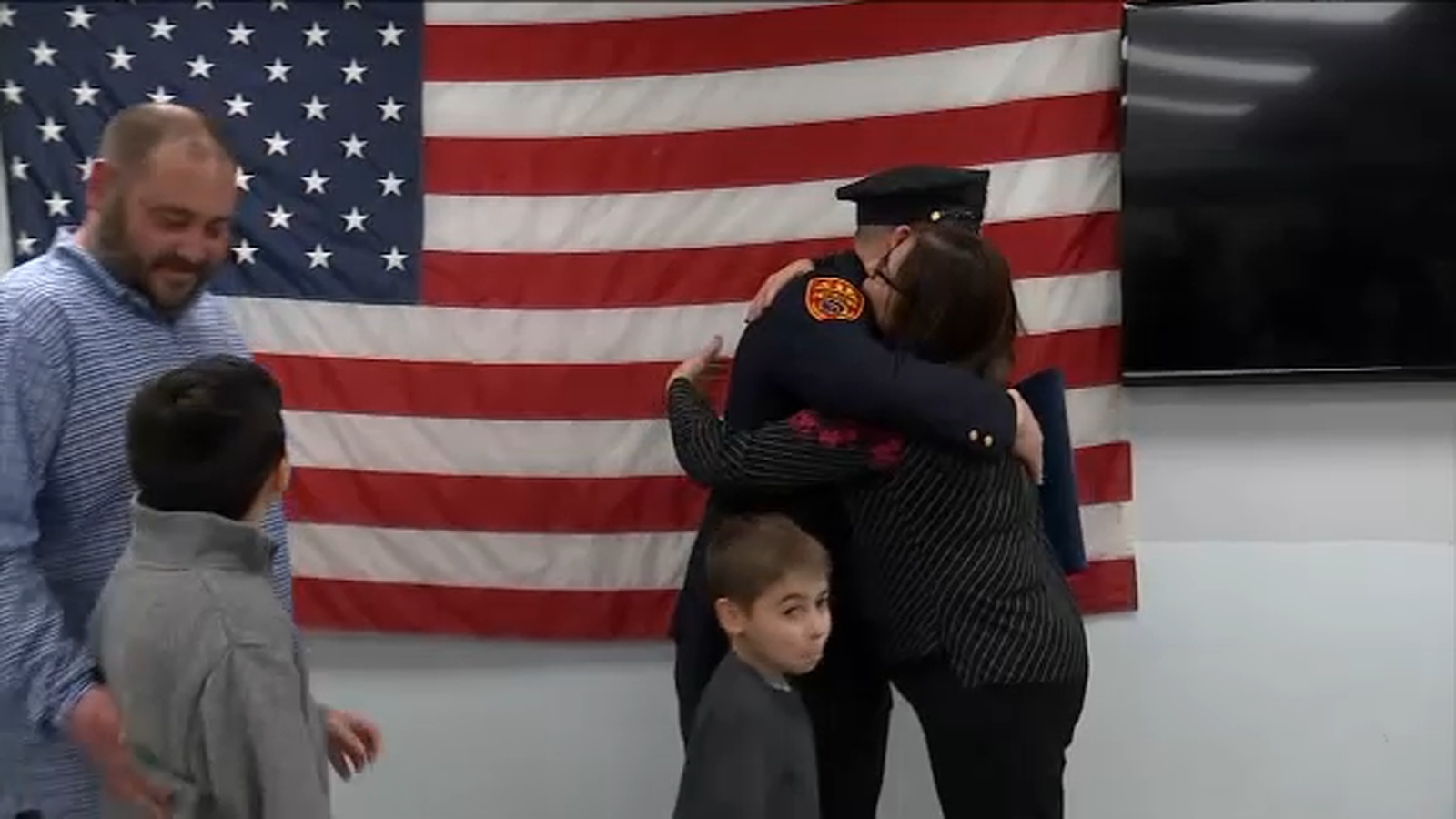 Suffolk County police officer reunited with family he rescued from fire ...