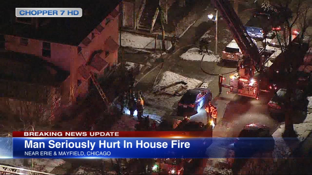Man critically injured after being rescued from roof in Austin house fire