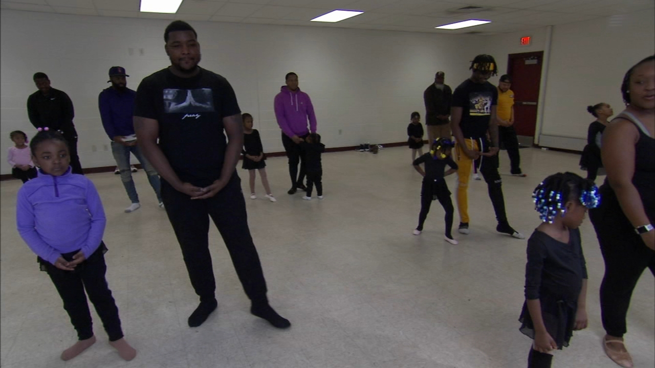 Dads, daughters share sweet moments during ballet class