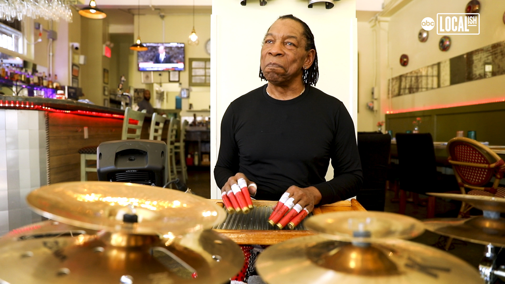Musician plays washboard in honor of enslaved grandfather