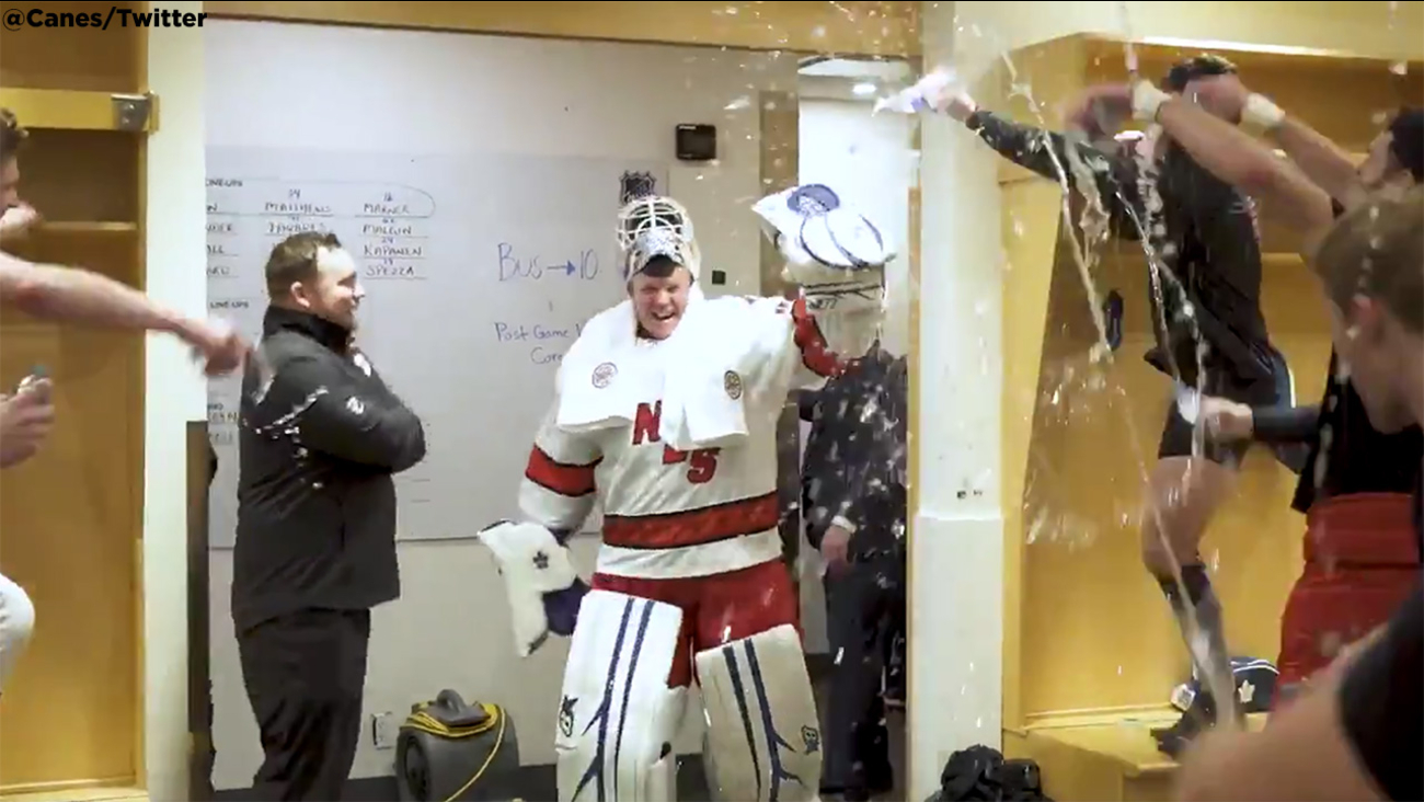 Zamboni driver David Ayres makes NHL debut as emergency goalie for