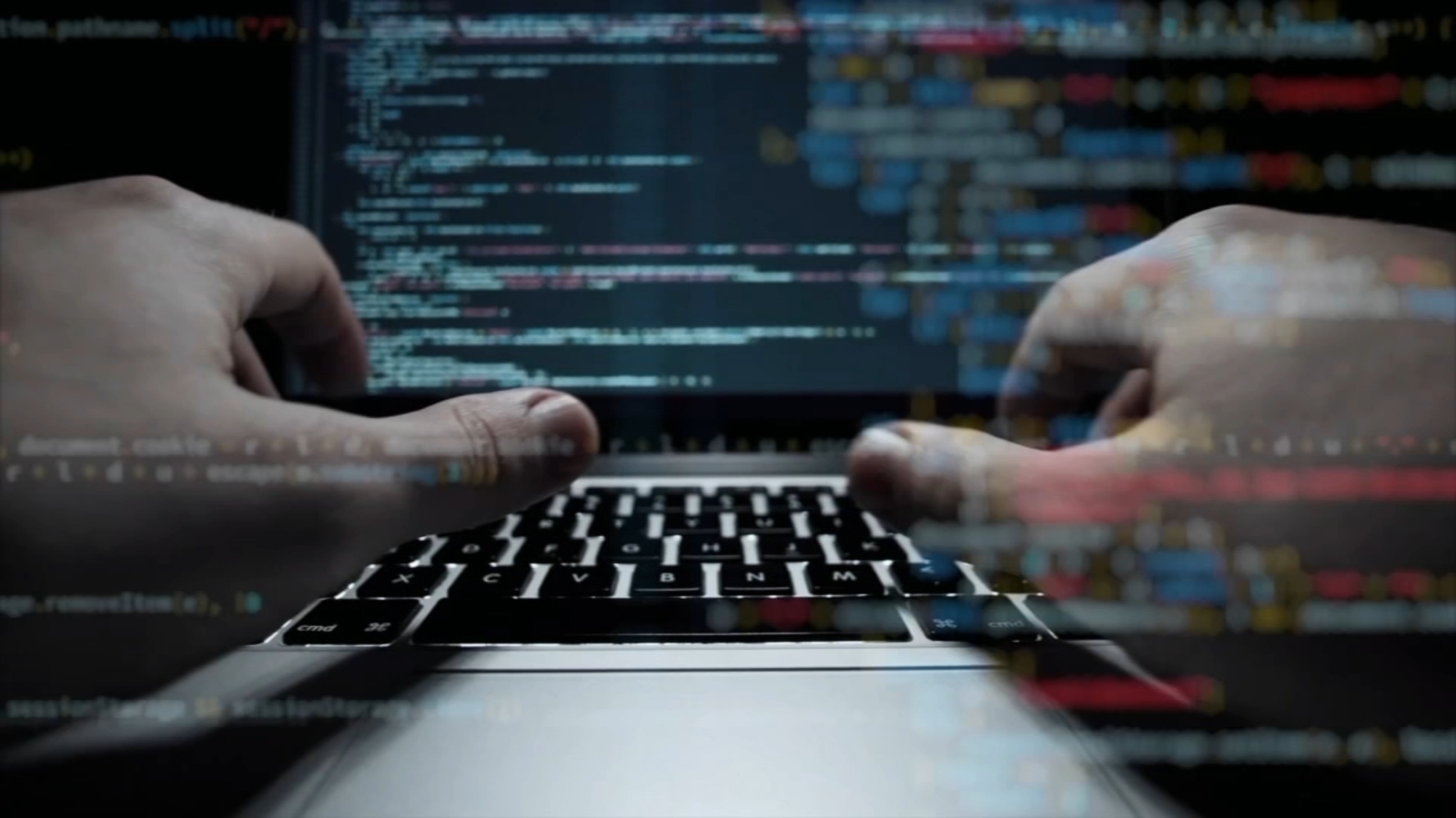 hands in front of laptop