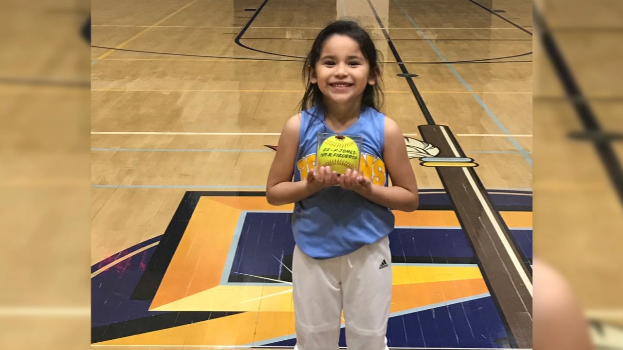 Daughter of late Porterville fire captain throws first pitch at softball match