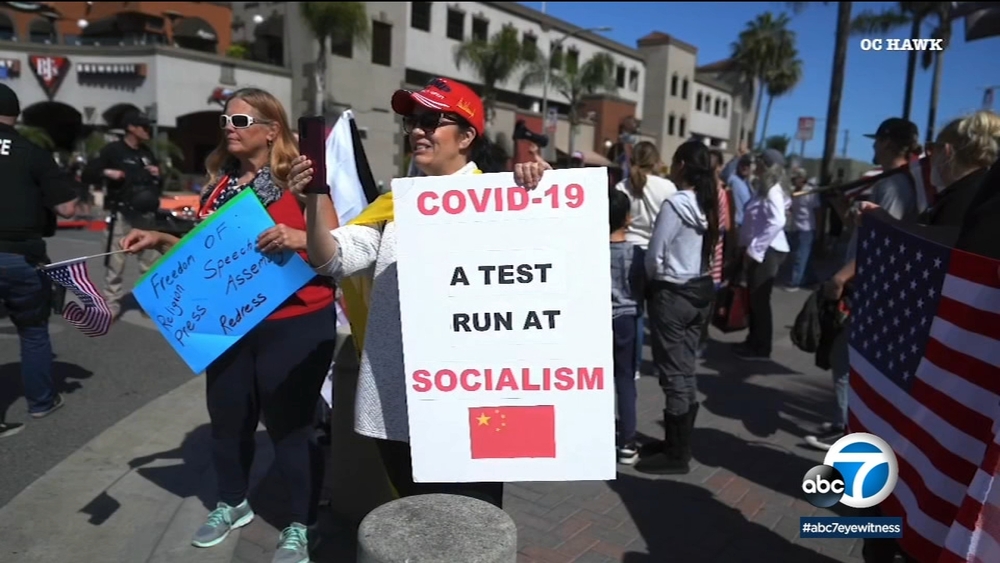 Over 200 gather in Huntington Beach to protest stay-at-home orders

