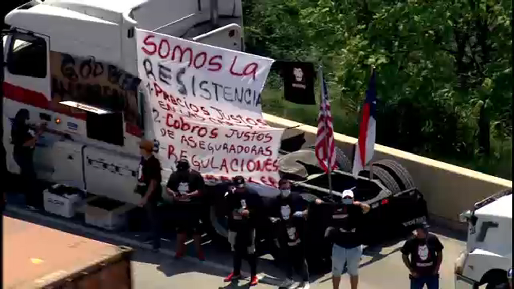 Rig drivers cause traffic during protest asking for "fair fees"on East Loop