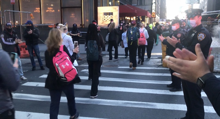 NYPD applauds doctors, nurses as they head to last shift before going home