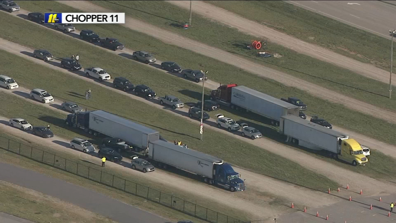 Cars line up overnight for surplus chicken sale at State Fairgrounds