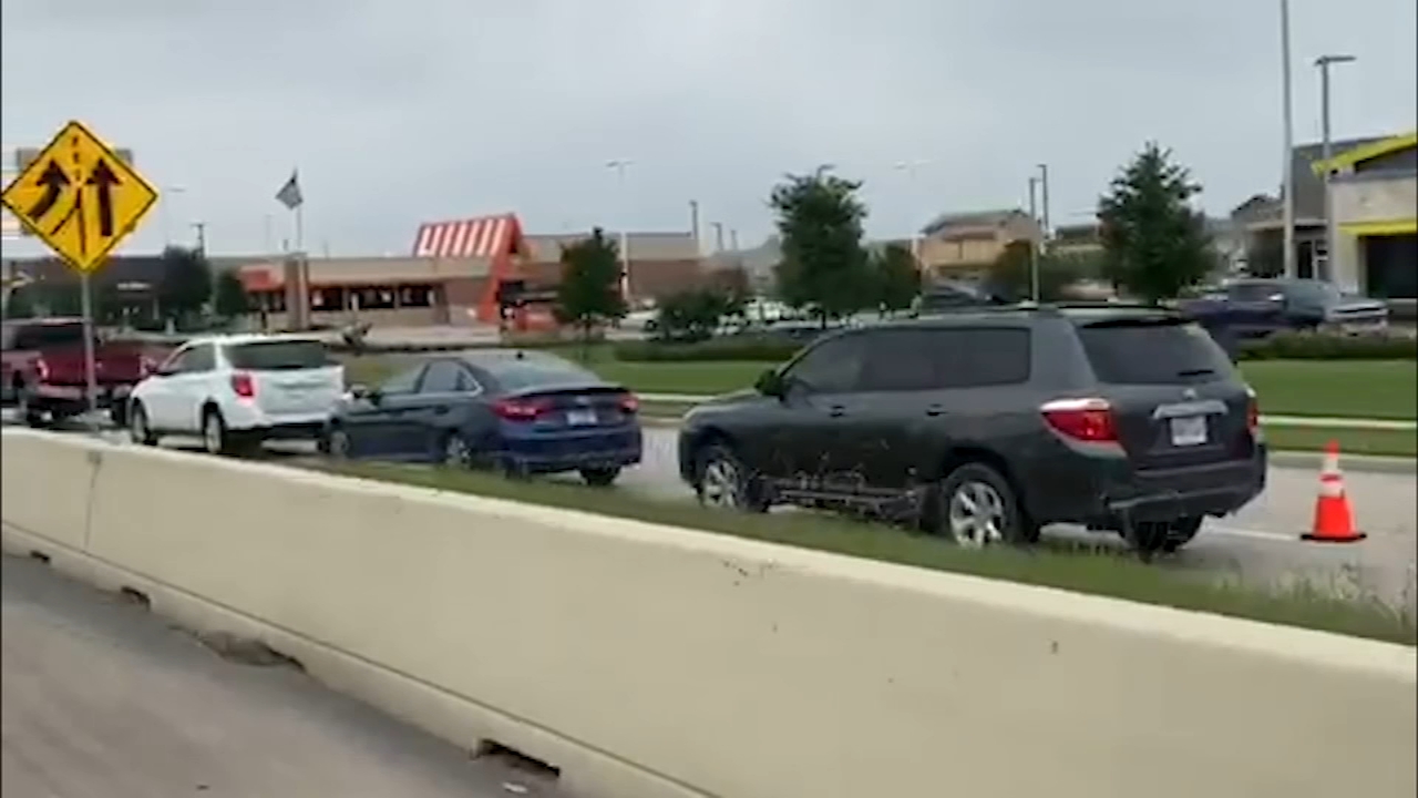 Hundreds wait hours for free food at Houston Premium Outlets