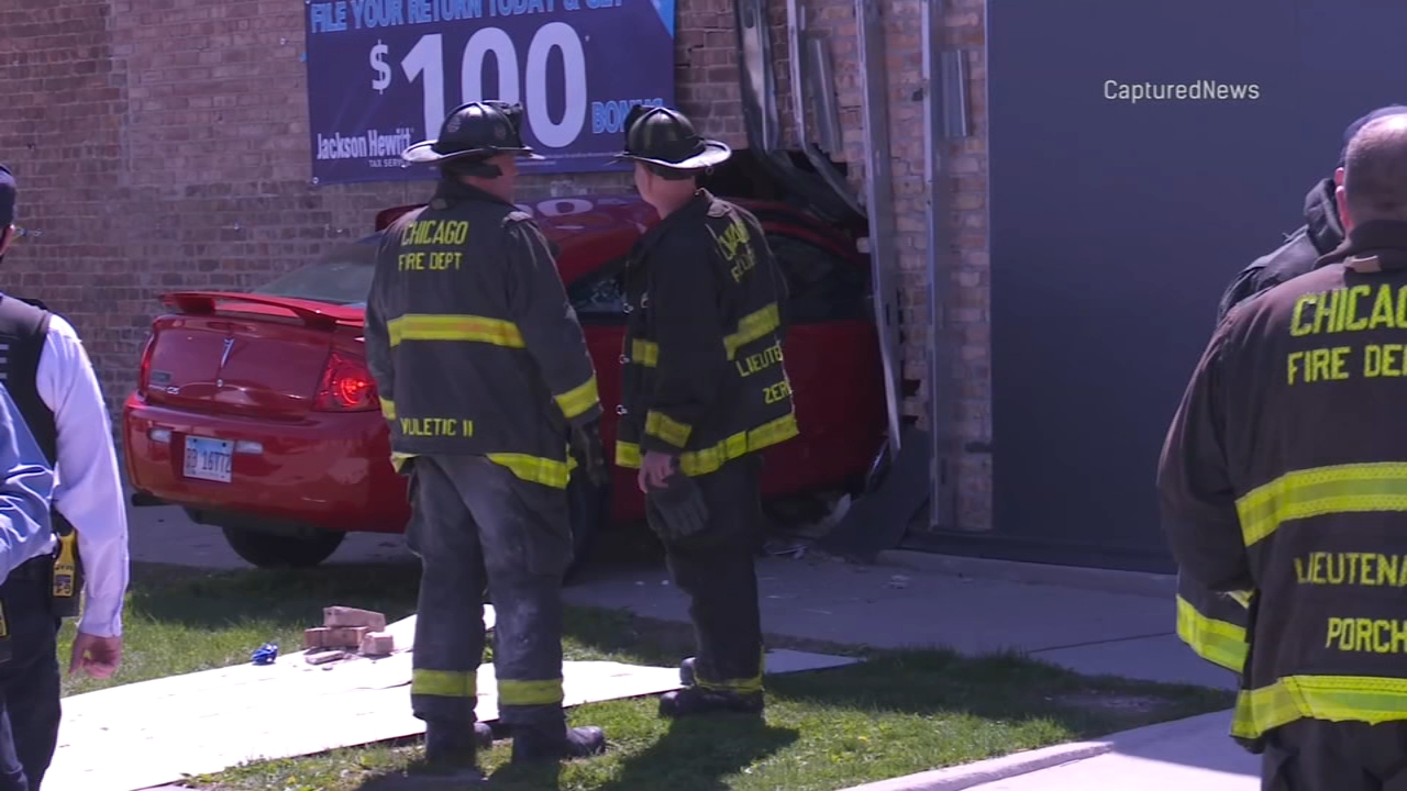 2 hospitalized after car crashes into building on Chicago's South Side