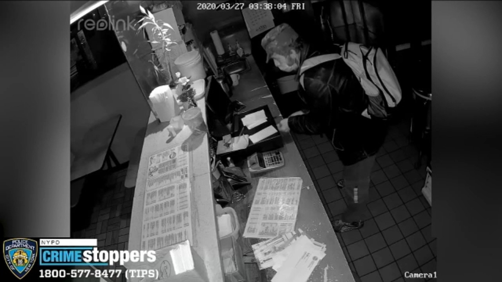 Video shows store burglar stealing cash in Queens