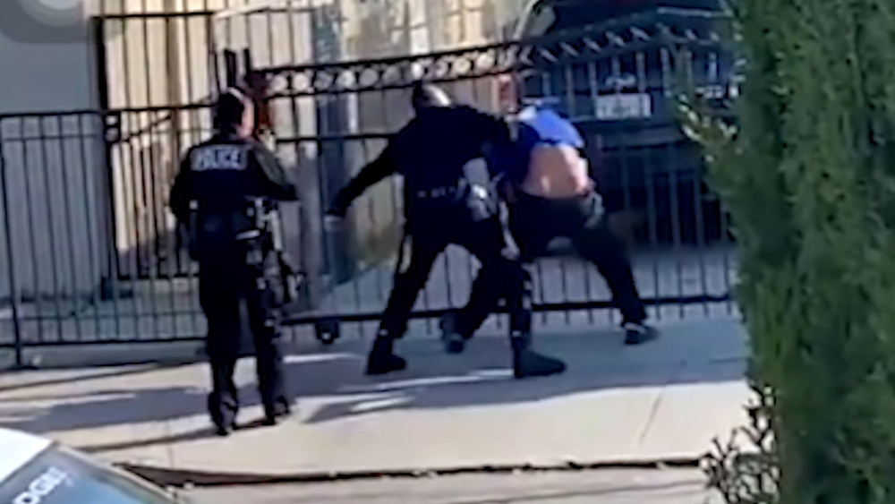 Video shows LAPD officer repeatedly punching suspect