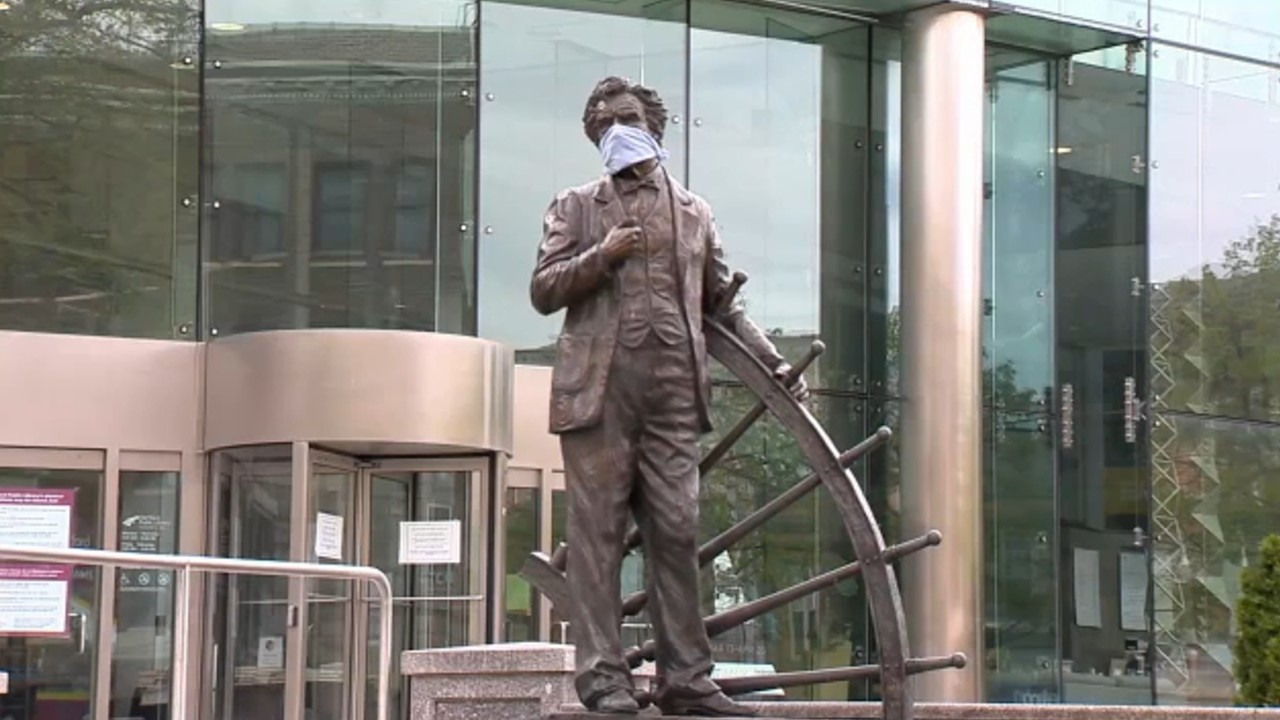 More than 2 dozen CT statues outfitted with face masks