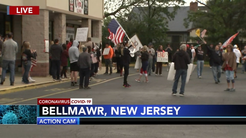 Supporters gather outside of Atilis Gym prior to reopening