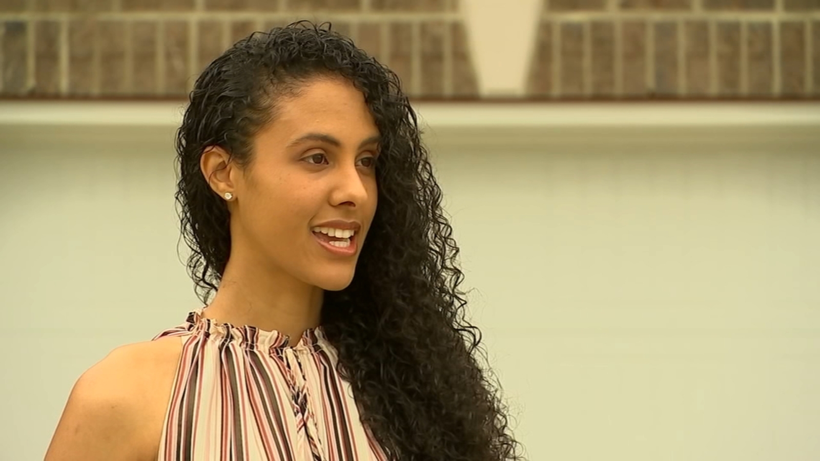 Holly Springs swim coach recognized for work with young athletes