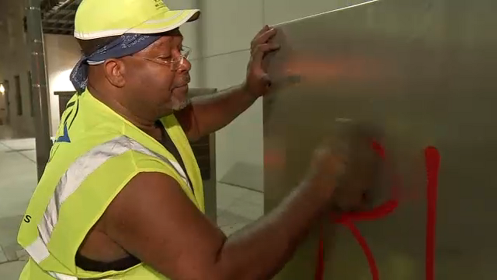 Man's love for Houston urges him to clean graffiti from protest