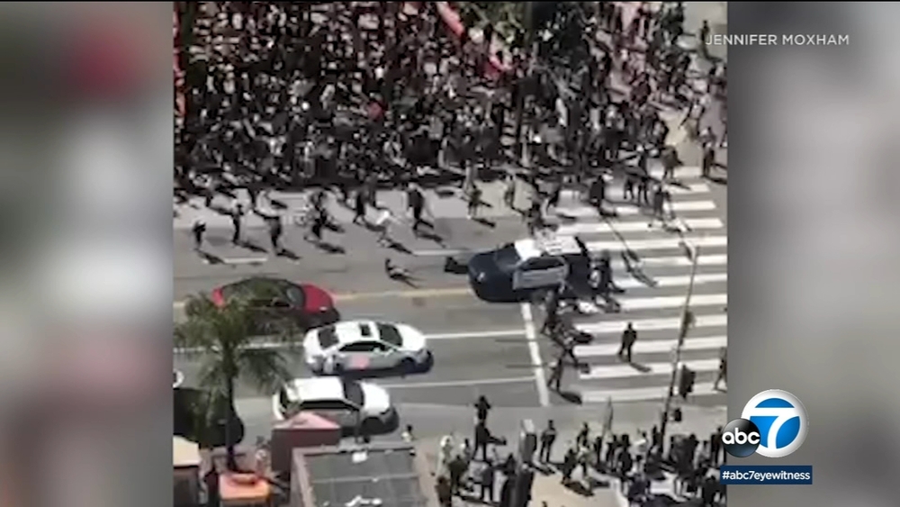 Protesters struck after surrounding police vehicle in DTLA - VIDEO