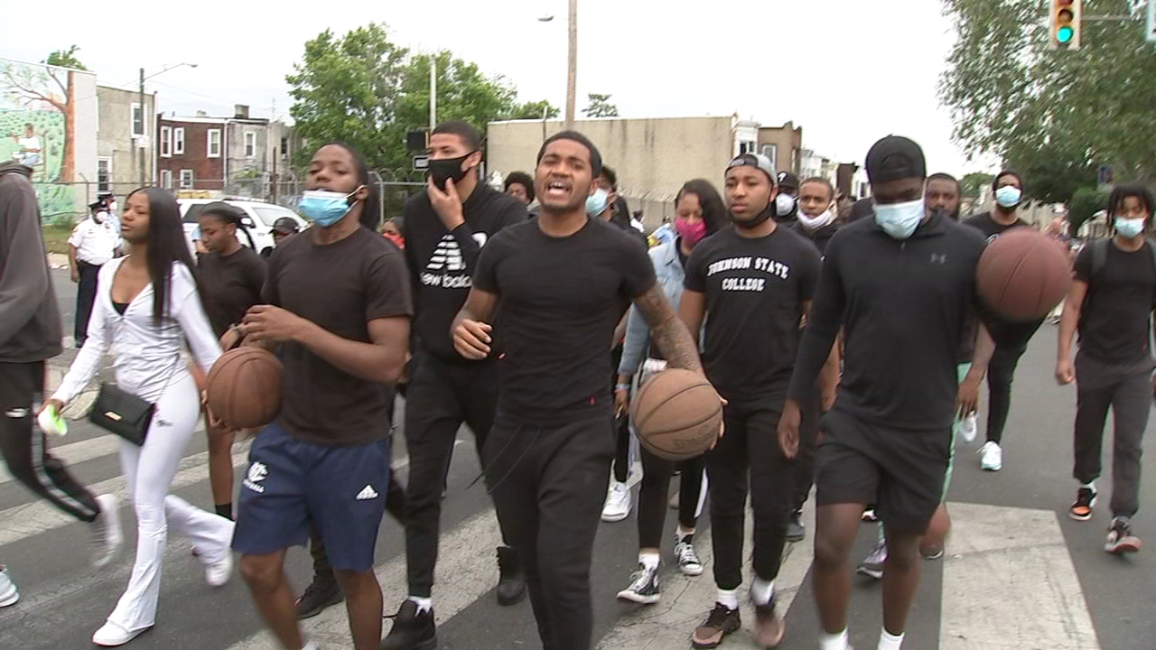 Young basketball players march through West Philly for social justice