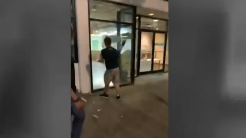 Raleigh police investigating after video shows vandal smashing windows of business during protest