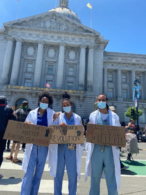 This June 4, 2020 image shows more health care workers at a protest for George Floyd in San Francisco.