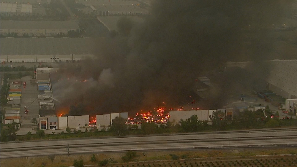 Three-alarm fire erupts at warehouse in Redlands