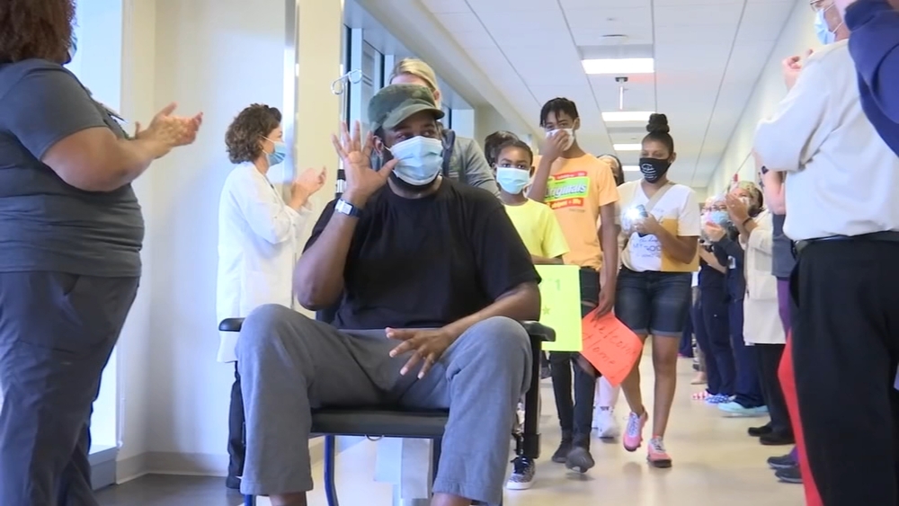 COVID-19 survivor makes grand departure after two months hospitalized