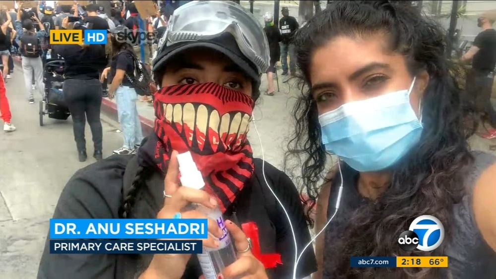 Local doctor, nurse hand out face masks, hand sanitizer to protesters in DTLA