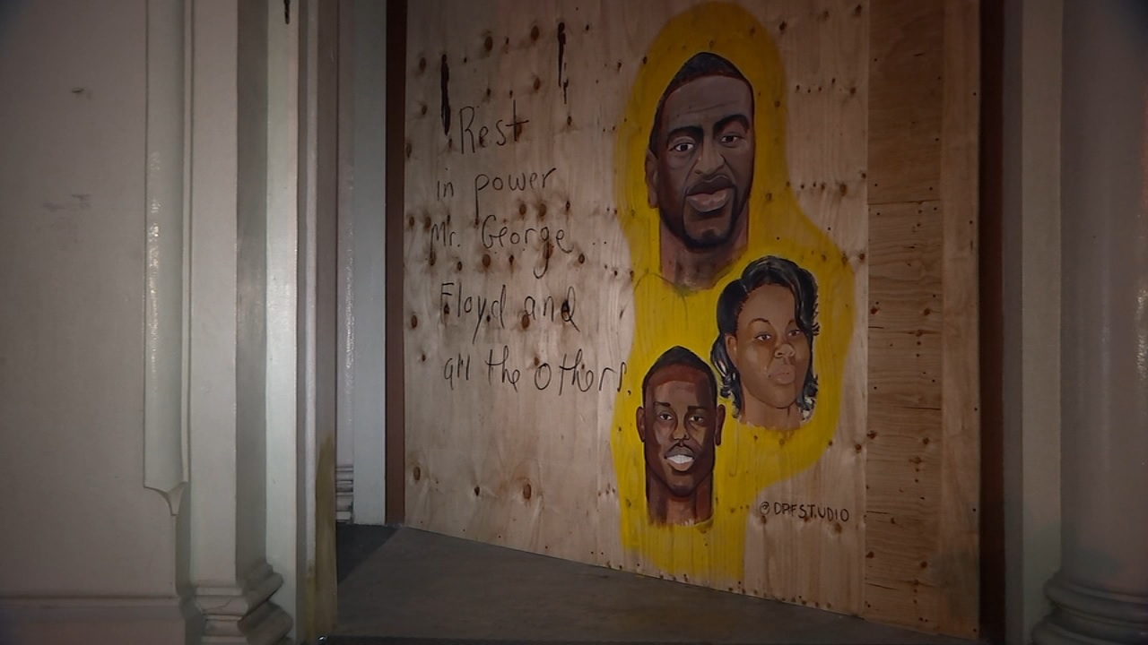 Artist paints Black Lives Matter mural on boarded up SoHo building