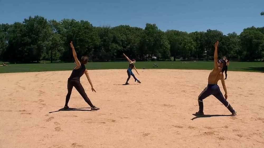 Ballet dancers perform on empty ballfields during COVID-19