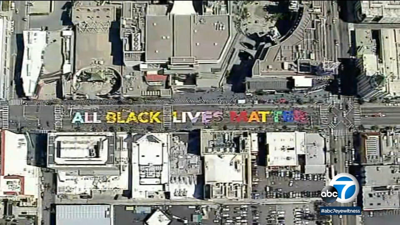 Crews attempt to wash away All Black Lives Matter mural after march